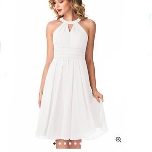 NWT. Never worn. Ivory midi dress